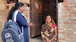 Frontline cadre interacitng with community