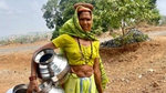 Woman collecting water