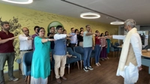 Group of people with arms raised