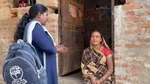 Frontline cadre interacitng with community